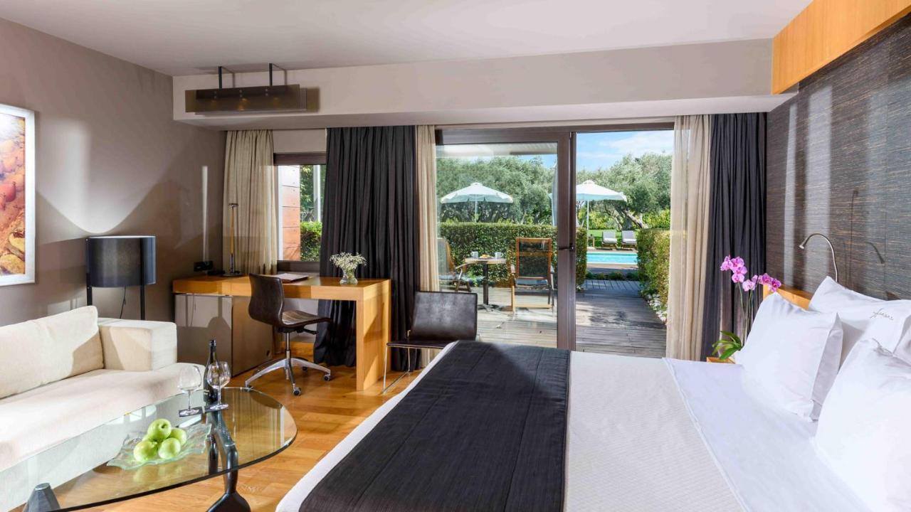 อเล็กซานเดอร์ บีช โฮเทล แอนด์ สปา Hotel อเล็กซานโดรโพลิส ภายนอก รูปภาพ A room at the hotel